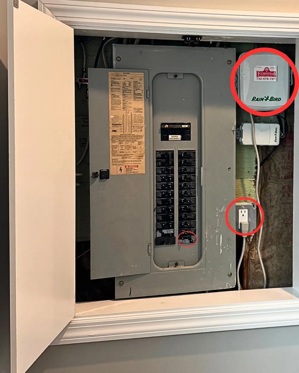 Neatly labeled residential panel with irrigation controller and dedicated outlet